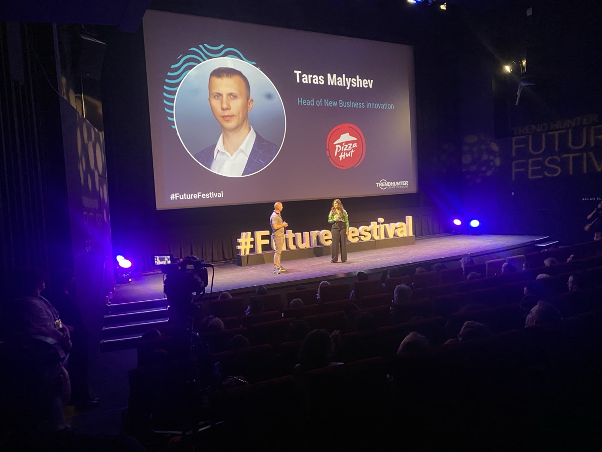 Taras Malyshev on stage at TrendHunter Future Festival
